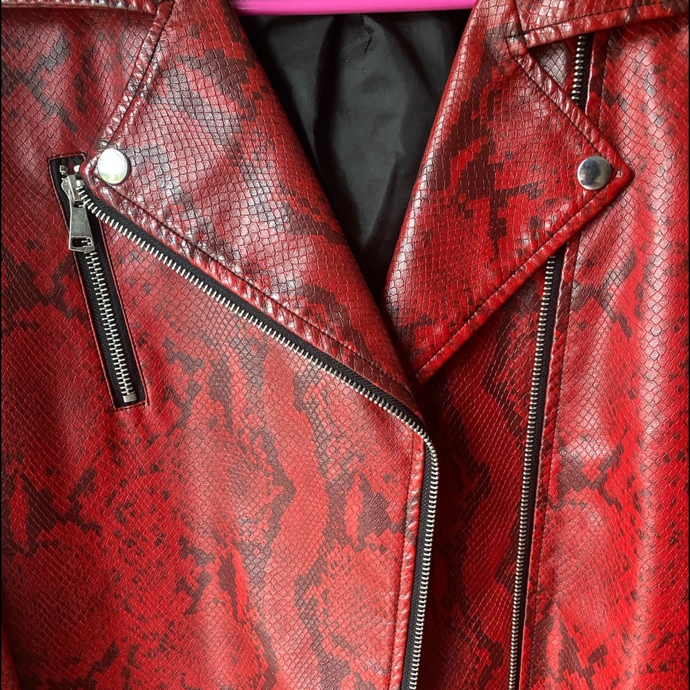 A red Baccini biker jacket , size is a Large